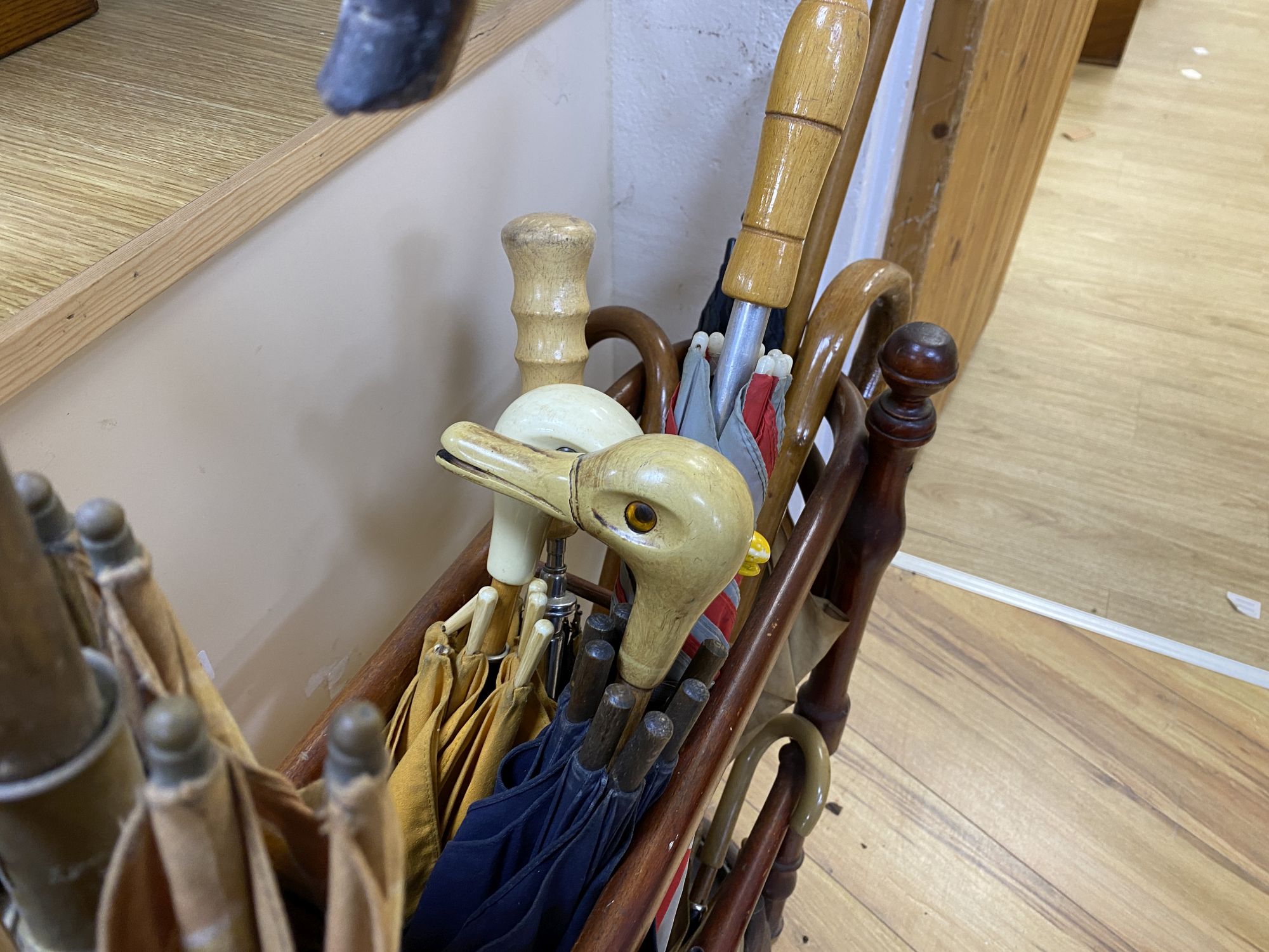 A bentwood stick stand and sticks